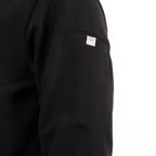 Black scrub set with modest hijabi-friendly design for women.