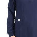 Navy modest-fit medical scrubs  uniform offering long coverage for Muslim and hijabi healthcare professionals.